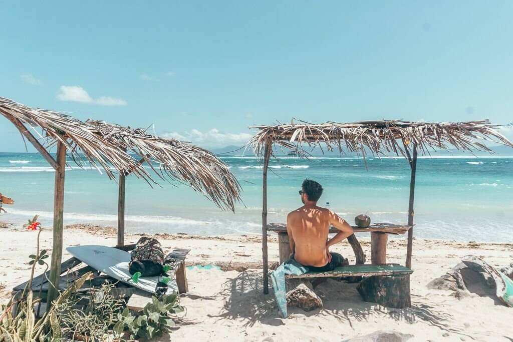 Attractions of Sumbawa - Having a coconut at Lakey Peak